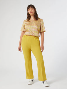 Pantaloni flare in jersey stretch, oro - N.O.W. MARINA RINALDI